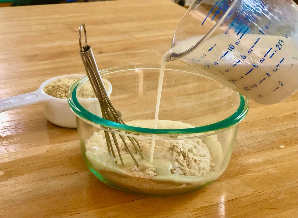 mixing cauliflower batter